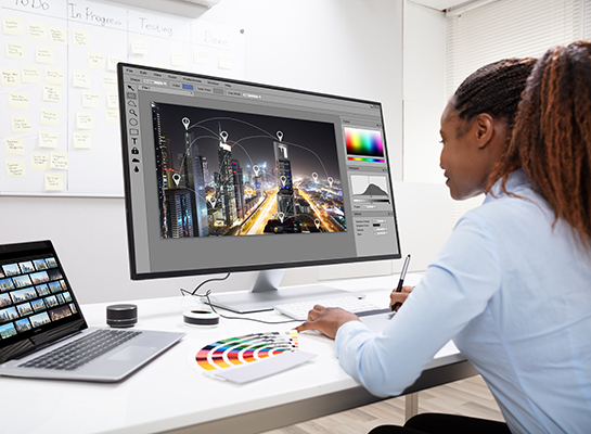 Digital marketing content creation services - professional laptop showing marketing campaigns in Uganda